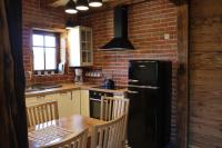 Kuchnia lub aneks kuchenny w obiekcie Herbarium Bieszczadzkie Apartamenty