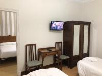 Posteľ alebo postele v izbe v ubytovaní Hostal La Mexicana