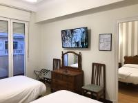 Posteľ alebo postele v izbe v ubytovaní Hostal La Mexicana