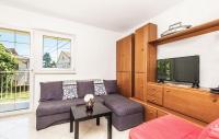 Televízia a/alebo spoločenská miestnosť v ubytovaní Apartments Relax near Opatija