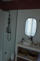 a bathroom with a sink and a mirror at Chambres d&#39;hôtes - La Maison 19 in Niort