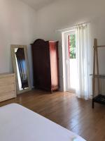 Posteľ alebo postele v izbe v ubytovaní Villa Parenzo 150mt dal mare 8min piedi dal centro