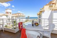 A balcony or terrace at 166 Talima C-3-A- Deniasol