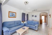 A seating area at 166 Talima C-3-A- Deniasol