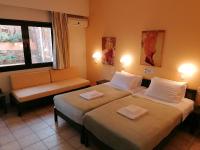 Posteľ alebo postele v izbe v ubytovaní Villiana Holiday Apartments