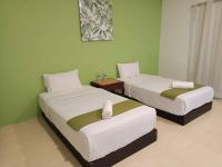 SANDY GARDEN RESORT LANGKAWIにあるベッド