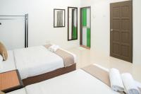 SANDY GARDEN RESORT LANGKAWIにあるベッド