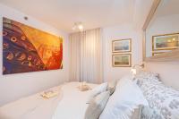 Posteľ alebo postele v izbe v ubytovaní Perfect Downtown Apartment A217