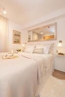 Posteľ alebo postele v izbe v ubytovaní Perfect Downtown Apartment A217
