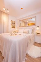 Posteľ alebo postele v izbe v ubytovaní Perfect Downtown Apartment A217