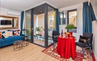 Televízia a/alebo spoločenská miestnosť v ubytovaní Perfect Downtown Apartment A217