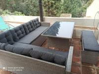 A seating area at Chalecito en la Herradura- Casa Kwetu