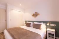 Posteľ alebo postele v izbe v ubytovaní Villa Ca na Tonina - La Goleta Hotel de Mar & Villas