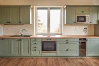 Kuchyň nebo kuchyňský kout v ubytování Urtica apartmány