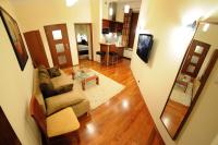 Televízia a/alebo spoločenská miestnosť v ubytovaní Atena - Pantheon Apartments