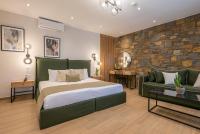 A bed or beds in a room at Αngelikon Luxurious Apartments