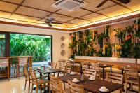 En restaurant eller et andet spisested på Lasanti Villas Seminyak