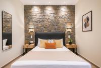 A bed or beds in a room at Αngelikon Luxurious Apartments