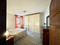 Posteľ alebo postele v izbe v ubytovaní Casa Vacanze La Casa di Nonna Libia vicino Saturnia