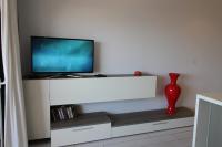 TV a/nebo společenská místnost v ubytování Vaso Rojo Vue impressionnante