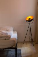 A bed or beds in a room at Servus at Naschmarkt