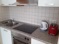 Kuchnia lub aneks kuchenny w obiekcie Apartment Conty on the ground floor