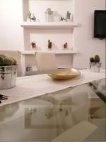 TV a/nebo společenská místnost v ubytování CASA VERDINA, nel cuore di Alghero