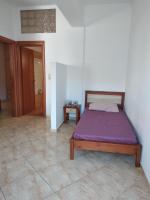 Posteľ alebo postele v izbe v ubytovaní Ton Mari Apartments