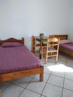 Posteľ alebo postele v izbe v ubytovaní Ton Mari Apartments