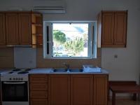 Kuchyňa alebo kuchynka v ubytovaní Ton Mari Apartments
