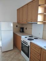 Kuchyňa alebo kuchynka v ubytovaní Ton Mari Apartments