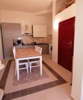 Kuchyň nebo kuchyňský kout v ubytování CASA VERDINA, nel cuore di Alghero