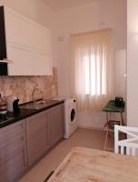 Kuchyň nebo kuchyňský kout v ubytování CASA VERDINA, nel cuore di Alghero