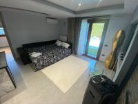 Posteľ alebo postele v izbe v ubytovaní Evelina’s house