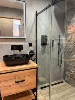 Kúpeľňa v ubytovaní APARTAMENT ELEGANCE BLUE w Let's Sea Basen&SPA
