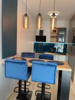 Kuchyňa alebo kuchynka v ubytovaní APARTAMENT ELEGANCE BLUE w Let's Sea Basen&SPA