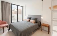 Postel nebo postele na pokoji v ubytování Apartamentos Málaga Premium - Calle Granada