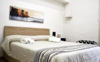 Posteľ alebo postele v izbe v ubytovaní Vanzi Rooms