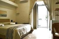 Posteľ alebo postele v izbe v ubytovaní Vanzi Rooms