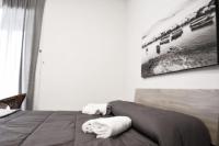 Posteľ alebo postele v izbe v ubytovaní Vanzi Rooms