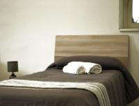 Posteľ alebo postele v izbe v ubytovaní Vanzi Rooms