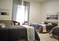 Posteľ alebo postele v izbe v ubytovaní Vanzi Rooms