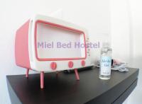 Postel nebo postele na pokoji v ubytování MIEL BED Hostel & Gallery
