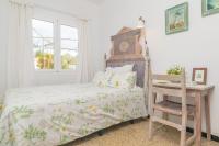 Łóżko lub łóżka w pokoju w obiekcie Construcciones Balaguer