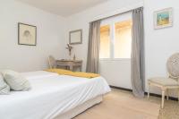Łóżko lub łóżka w pokoju w obiekcie Construcciones Balaguer