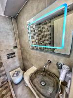 a bathroom with a sink and a toilet at George Studios in Naxos Chora