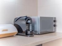 Kuchyňa alebo kuchynka v ubytovaní Moya Bay Apartament