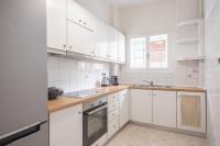 Kuchyň nebo kuchyňský kout v ubytování Victoria Majestic Suites Apartments