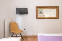 TV a/nebo společenská místnost v ubytování Victoria Majestic Suites Apartments