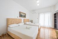 Postel nebo postele na pokoji v ubytování Victoria Majestic Suites Apartments